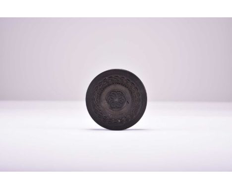 A Chinese carved tortoiseshell box and cover, Qing Dynasty, 19th centuryOf circular form, the cover carved with turned concen