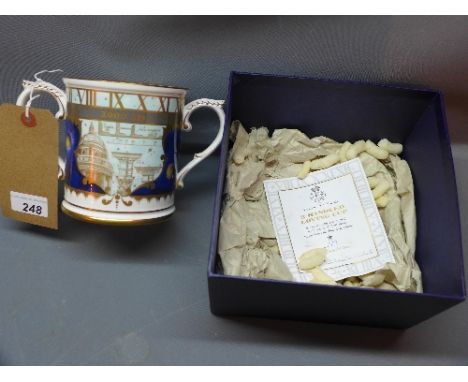 A Royal Worcester porcelain twin handled loving cup to celebrate the Millennium numbered 199/500, in original box. 
