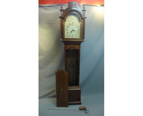 An Edwardian mahogany longcase clock by Cotterill Winksworth, the arch dial with Arabic numbers, gilt painted spandrels, the 