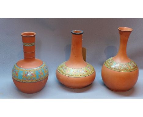 Three 19th Century terracotta Prattware vases of ovoid and squat form with elongated necks, having enamelled griffin decorati