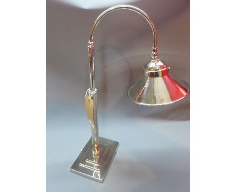 An Art Deco style silver plated adjustable desk lamp. 