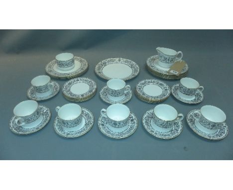 A Royal Worcester porcelain part tea service with padua pattern