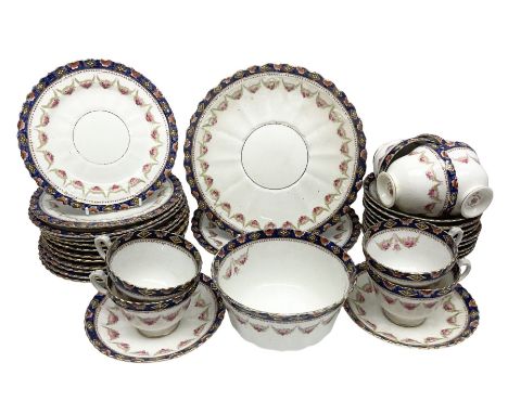 Early 19th century Royal Albert Imari pattern part tea service, comprising eight teacups, eleven saucers, twelve side plates,