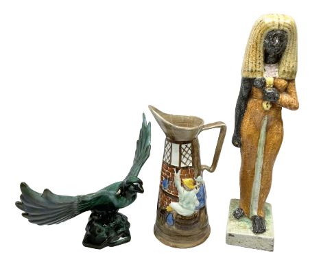 Canadian Blue Mountain eagle figure, Faience Egyptian Goddess figure donning orange dress, and Radford jug, tallest H43cm