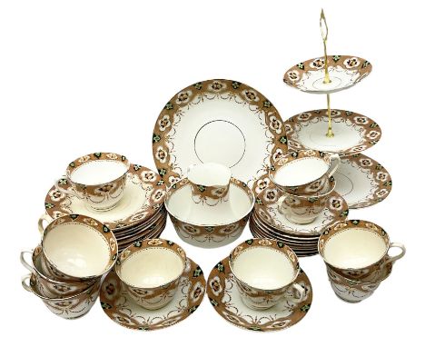 Royal Albert Imari pattern teawares, to include three tier cake stand, jug and open sucrier, teacups and saucres and side pla