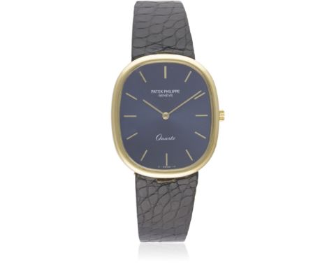 A GENTLEMAN'S 18K SOLID GOLD PATEK PHILIPPE ELLIPSE QUARTZ WRIST WATCH CIRCA 1980sD: Blue sunburst dial with gold batons & ha