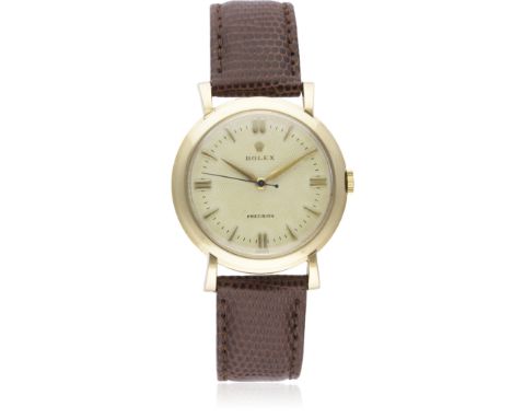 A RARE GENTLEMAN'S 9CT SOLID GOLD ROLEX WRIST WATCH CIRCA 1950s
D: Silver "honeycomb" dial with gilt batons &amp; "dagger" ha