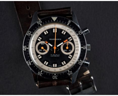 A RARE GENTLEMAN’S WAKMANN "BIG BOY" CHRONOGRAPH WRIST WATCH CIRCA 1968 D: Black dial with black inlaid silver markers, doubl