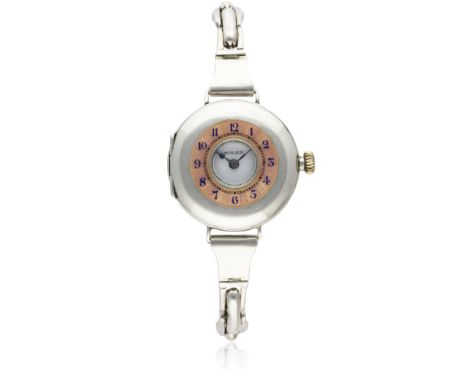 A LADIES SOLID SILVER & ENAMEL ROLEX HALF HUNTER BRACELET WATCH CIRCA 1920s D: White enamel dial. M: Manual wind movement sig
