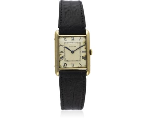 A RARE GENTLEMAN'S 18K SOLID GOLD CARTIER TANK WRIST WATCH CIRCA 1950 D: Silver dial with Roman numerals. M: 18 jewel manual 