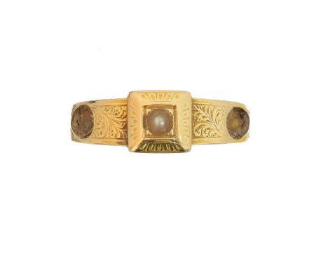 A Victorian split pearl memorial ring, A Victorian split pearl memorial ring, the split pearl within a scrolling surround and