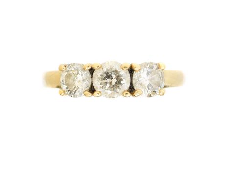 An 18ct gold diamond three stone ring, An 18ct gold diamond three stone ring, the brilliant cut diamond line with tapered sho