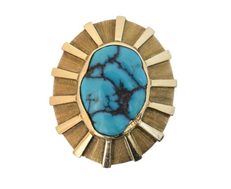 A turquoise dress ring, A turquoise dress ring, the freeform turquoise within a polished and textured surround, stamped 14K, 