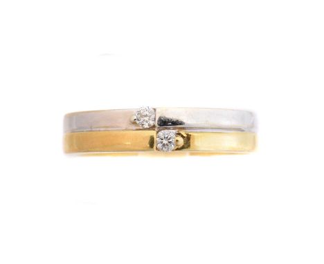 An 18ct gold diamond band ring, An 18ct gold diamond band ring, the brilliant cut diamond duo inset to the bi-colour grooved 