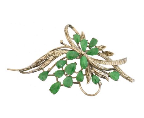 A jade pendant, A jade pendant, the pear shape jade cabochons inset to the spray surround, Chinese marks, length 6.3cm, gross