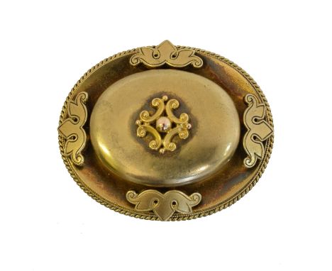 A Victorian Etruscan brooch, A Victorian Etruscan brooch, of oval form, with scrolling and beadwork detailing, to the vacant 