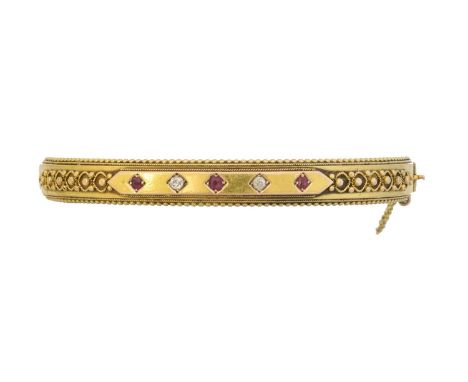 A late Victorian 15ct gold ruby and diamond hinged bangle, A late Victorian 15ct gold ruby and diamond hinged bangle, hallmar