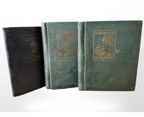 Three vintage stamp albums containing stamps of the world 