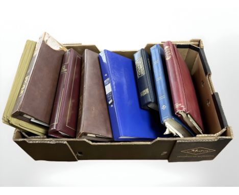 A box of quantity of stock stamp albums, antique and later stamps, two vintage journals etc 
