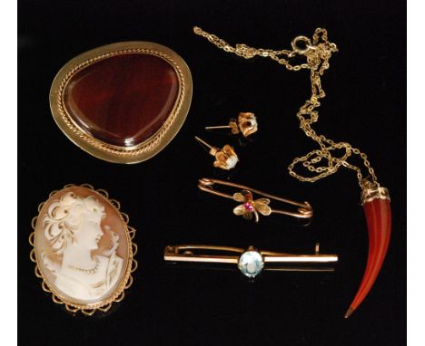 A modern 9ct mounted carnelian brooch of irregular form, together with three further brooches a pair of opal stud earrings an