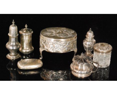 A hallmarked silver oval trinket box with embossed decoration depicting Reynolds angels on four cabriole feet, Birmingham 190