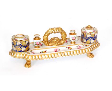 An early 19th Century Chamberlain Worcester desk inkwell, the rectangular body with hand painted floral sprays and gilt detai