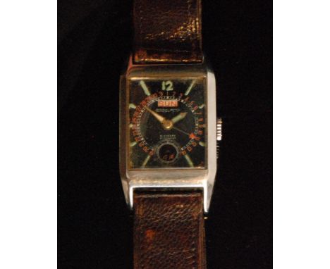 A 1940s Jaeger LeCoultre stainless steel gentleman's wristwatch, the black rectangular dial with green luminous baton markers