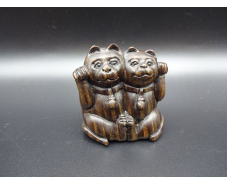 NETSUKE CARVED WOODEN ANIMAL FIGURE