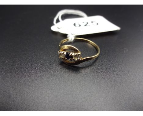 9K GOLD RING WITH WHITE AND BLACK STONES 1.2g