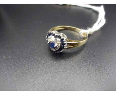 9CT GOLD RING WITH WHITE AND BLUE STONE CLUSTER IN HEART SHAPE 3.3g