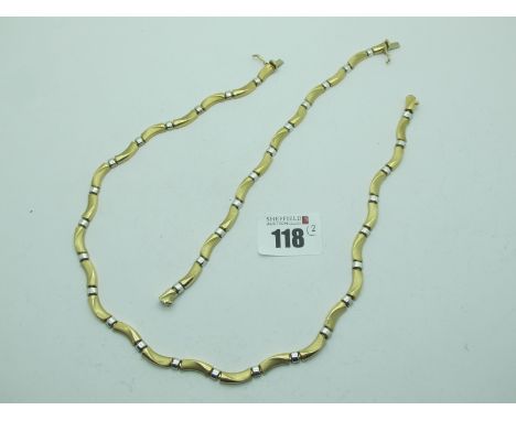 A Modern Wave Style Necklace of Alternate Panel, stamped "375", with matching bracelet (total weight 25 grams).