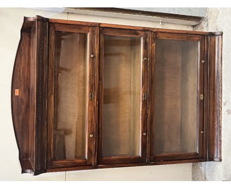 A Lebus sectional bookcase in three glazed parts. 35' w x 54' h