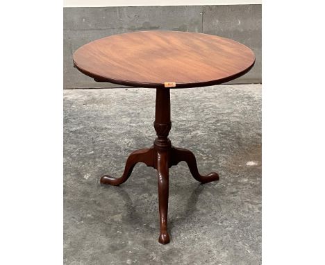 A 19th century mahogany tripod table, the one piece snap top on tapered column with wrythen knop. 30' diam.