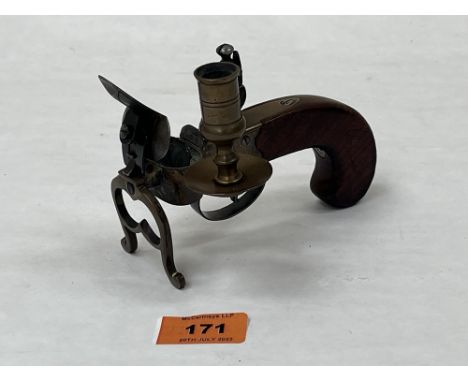 A 20th century flintlock table lighter with walnut stock. 5¼' long.