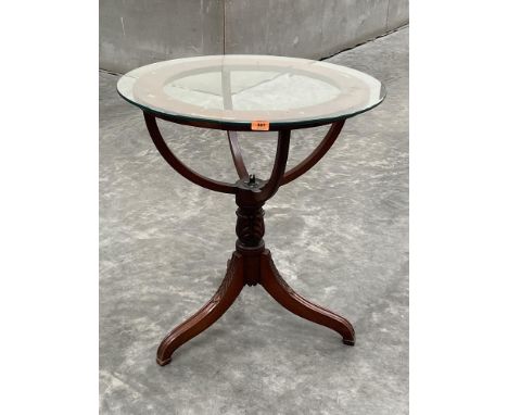 A mahogany terrestrial or celestial globe frame on tripod support, fitted with glass top. 27' diam