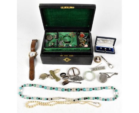 A vintage jewellery box containing a good assortment of costume jewellery including a Victorian pearl adorned and painted ena