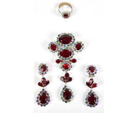 CHRISTIAN DIOR; a silver toned suite of jewellery set with ruby coloured and opalescent paste stones comprising pendant/brooc