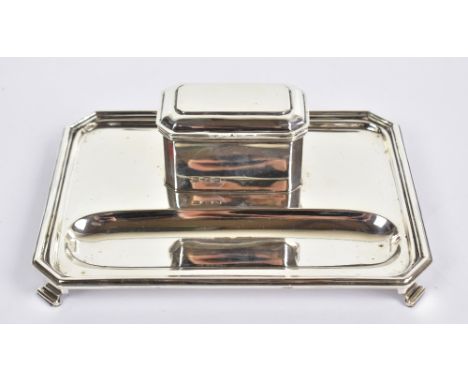 S W SMITH &amp; CO; a George V hallmarked silver ink standish, the inkwell with hinged canted rectangular lid enclosing a cle