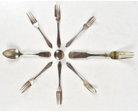 A Russian silver table fork with chased scrolling detail, together with a set of six hallmarked silver cake forks, hallmarked