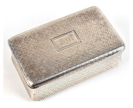 A George III hallmarked silver snuff box of rounded rectangular form with all-over engraved decoration and with initials to t