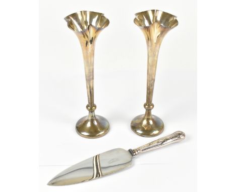 HORACE WOODWARD &amp; CO LTD; a pair of Victorian hallmarked silver vases with lobed rims on tapered knopped stems to loaded 