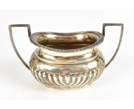 THOMAS BRADBURY &amp; SONS; an Edward VII hallmarked silver twin handled sugar bowl with part gadrooned decoration, Sheffield