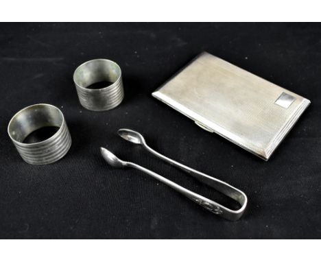 ANGLO-ORIENT TRADING COMPANY LTD; a George VI hallmarked silver cigarette case with engine turned decoration, Birmingham 1946