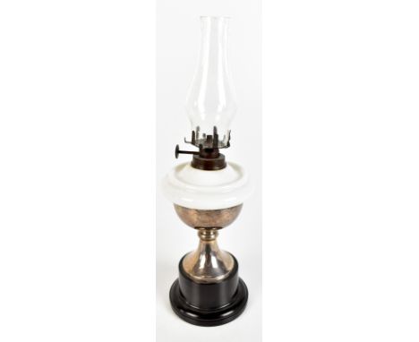 ALEXANDER CLARK &amp; CO LTD; a hallmarked silver oil lamp of small proportions, with milk glass reservoir and silver body, r