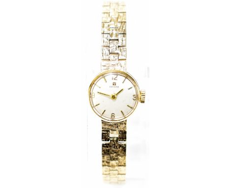 TISSOT; a lady’s 9ct yellow gold mechanical cocktail bracelet watch, the circular dial set with baton numerals, diameter excl