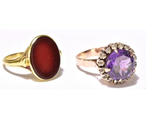 A 14ct yellow gold signet ring set with vacant oval cut carnelian, stamped 585 to band interior, size S, and a 14ct gold dres