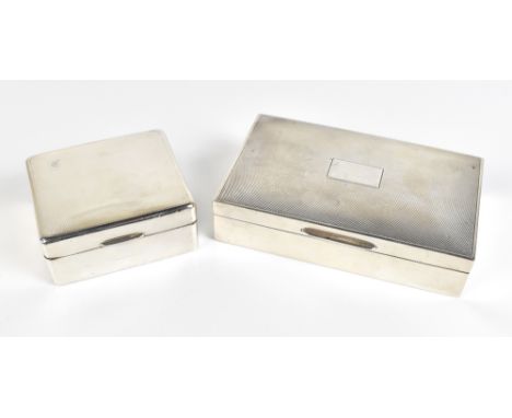JOSEPH GLOSTER; an Elizabeth II hallmarked silver cigarette case of rectangular form with engine turned decoration to the cov