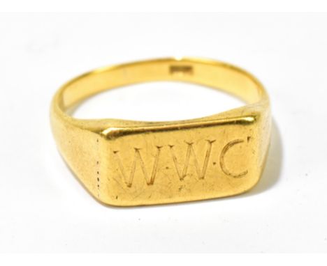 An 18ct yellow gold signet ring with engraved initials W.C, size S, approx 8g.Additional InformationThe ring is slightly miss