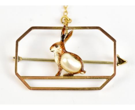 A 1930s 9ct yellow gold open work brooch featuring enamelled hare set with single freshwater baroque pearl to centre, stamped