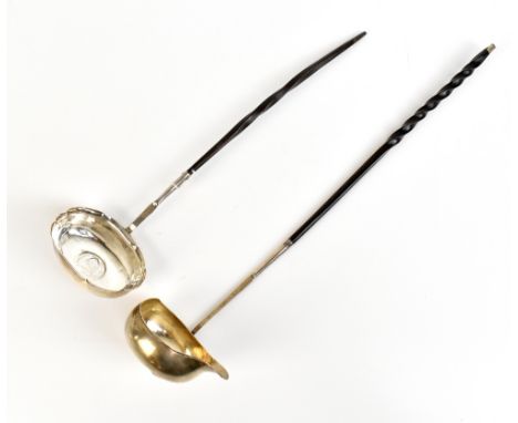 A Georgian silver toddy ladle set with George II 1758 shilling to bowl and with baleen handle, length 28cm, and a further unm